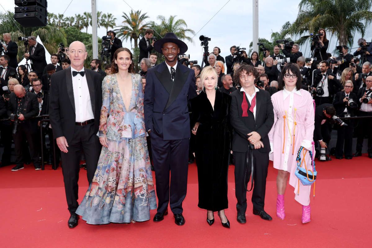 Baloji In Louis Vuitton At The Opening Ceremony Of The 77th Cannes Film Festival