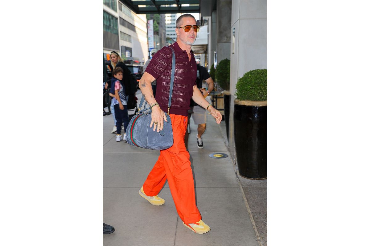 Brad Pitt Carrying A Gucci Duffle Bag