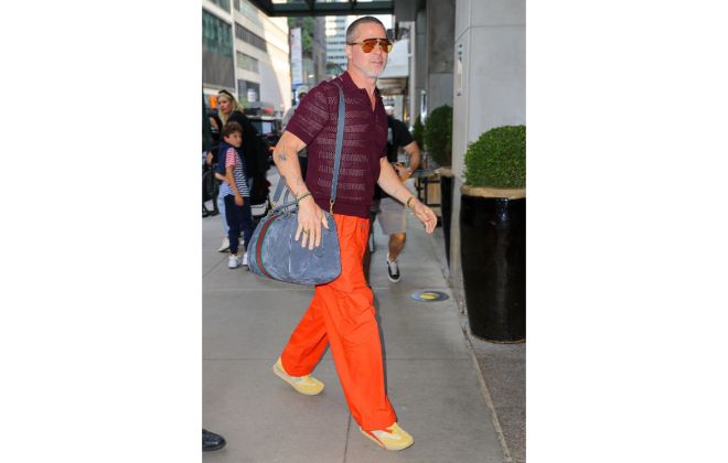 Brad Pitt Carrying A Gucci Duffle Bag