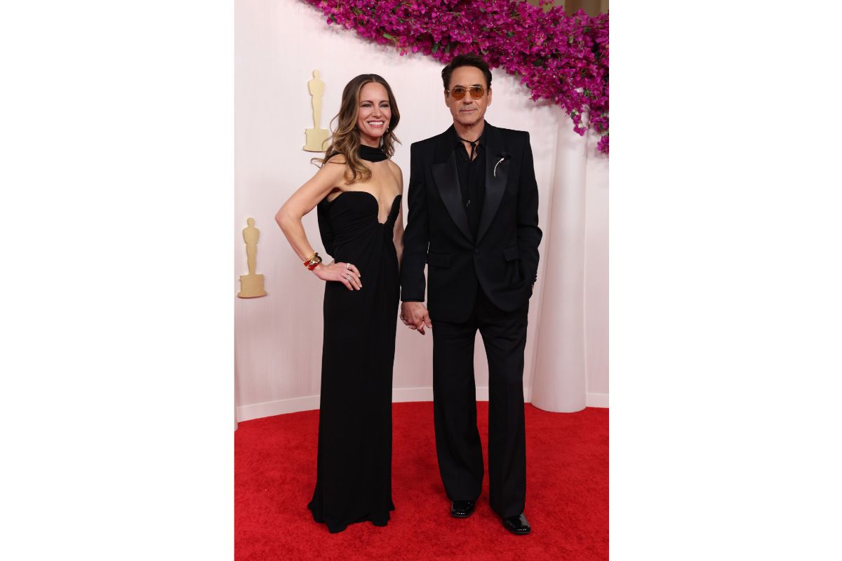 Susan Downey And Robert Downey Jr. In Saint Laurent At The 96th Annual Academy Awards
