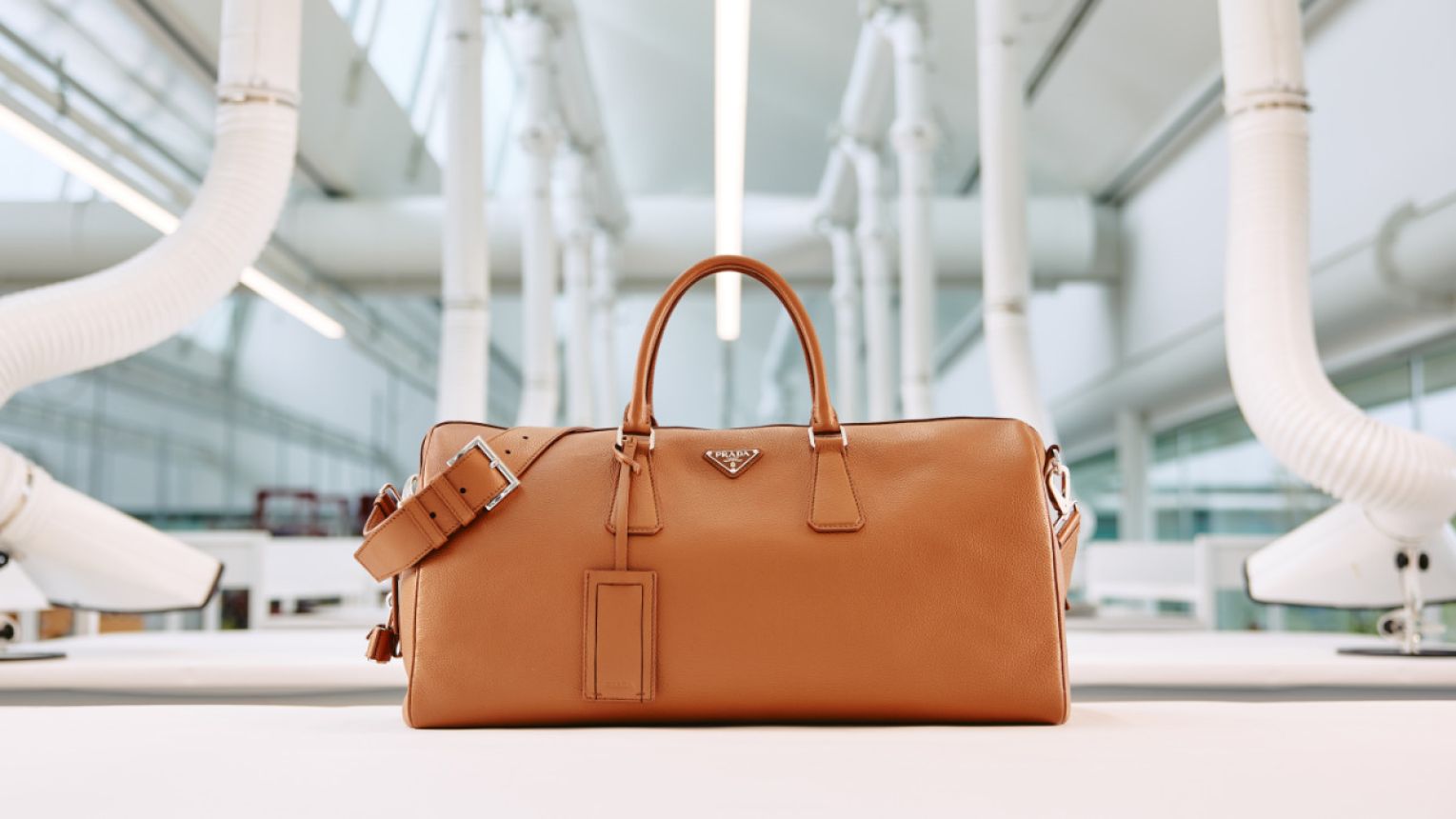 Prada Redefines Luxury Travel With The New Duffel Bag