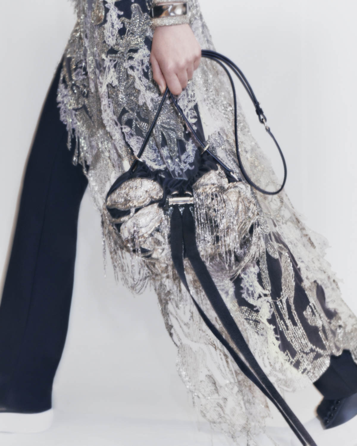 Elle Fanning Spotlights Elegance in Alexander McQueen's Exclusive Peak Bag  Collection Unveiling