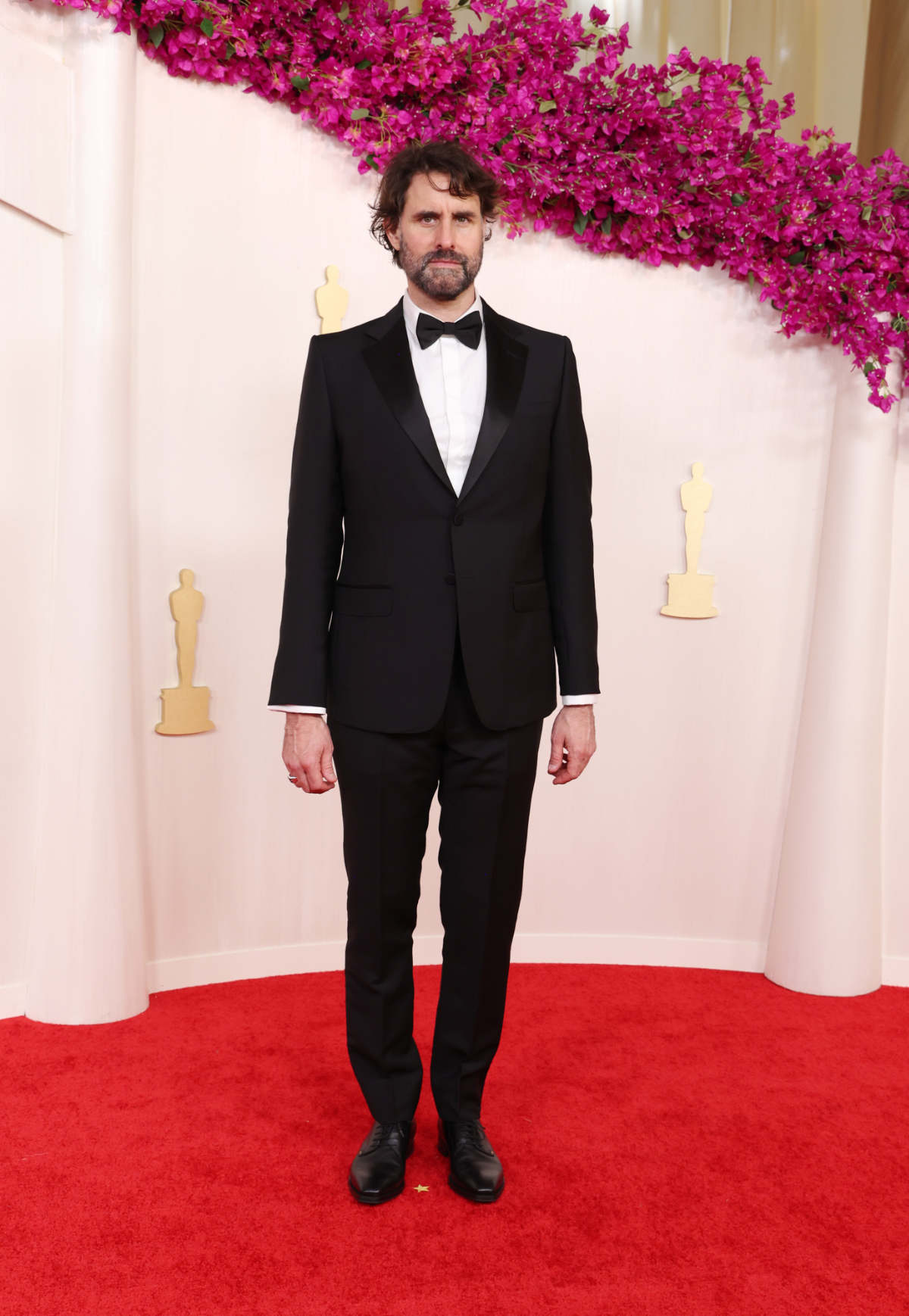 Andrew Wyatt In Gucci At The 96th Annual Academy Awards