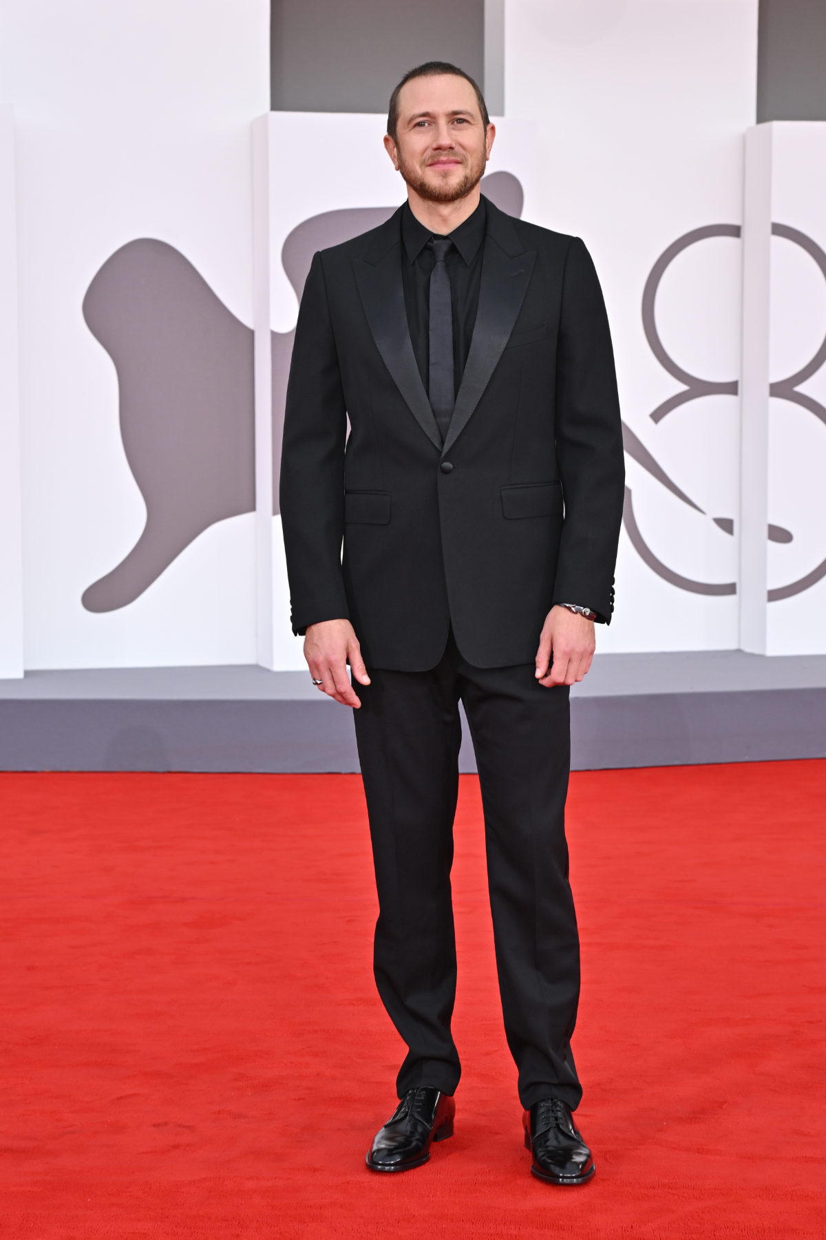 Celebrities Wear CELINE HOMME At The 82nd Venice Film Festival