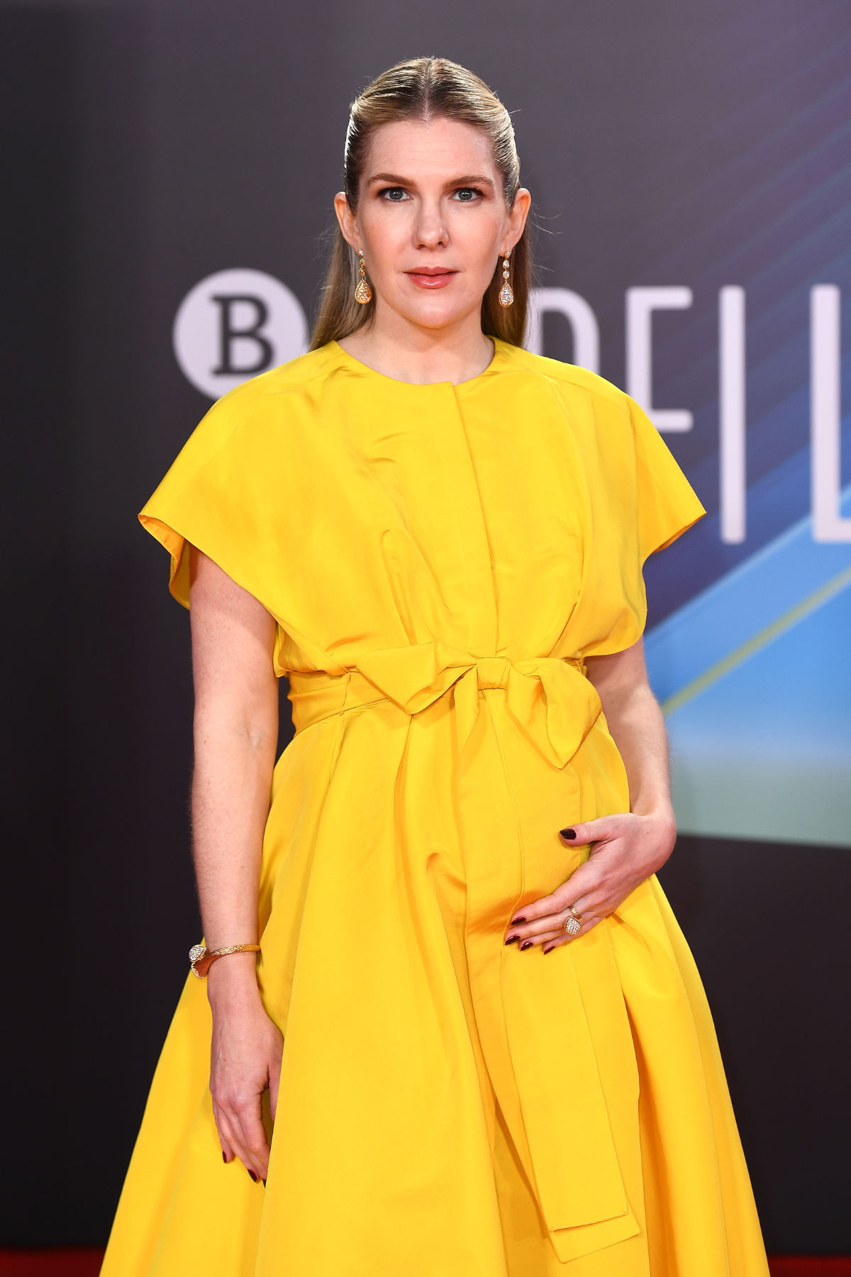Lily Rabe In Boucheron Jewelry To The Premiere Of George Clooney's Film 