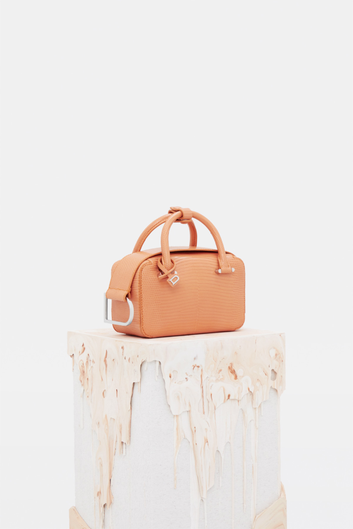 Delvaux - Our new Cool Box Nano is summer-ready in bright apricot with  contrasting edges. Accessorize for summer with Delvaux's most vibrant  collection yet. Shop your favourites online