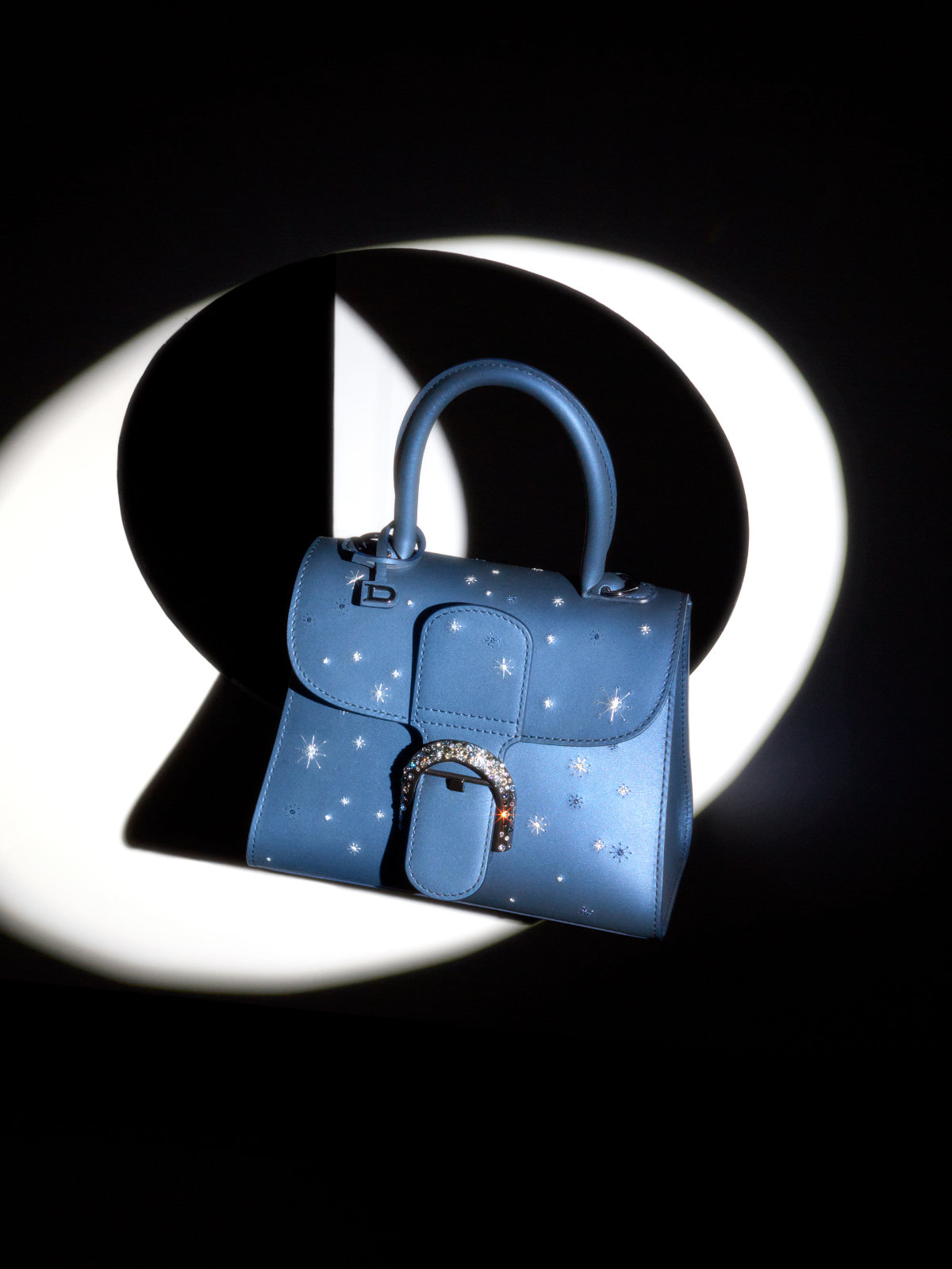 Delvaux - The soft Brillant Mini Sweet Cloud is the perfect companion for  this holiday season. Discover our creations on Delvaux.com.