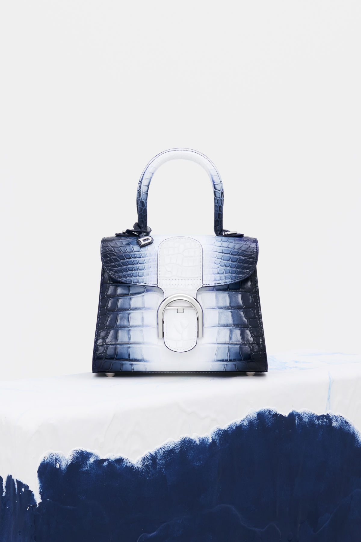 Delvaux - Elegance and ease. Freedom and refinement. Meet the Pin Mini  Bucket Canvas. Explore the entire collection at eu.delvaux.com and in  Delvaux boutiques worldwide. #DelvauxBrillant
