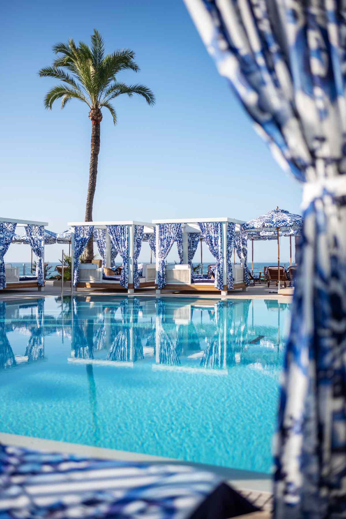 From Saint-Tropez To Casa Amor, 9 Luxury Fashion Brands Are Taking Over Beach  Clubs This Summer