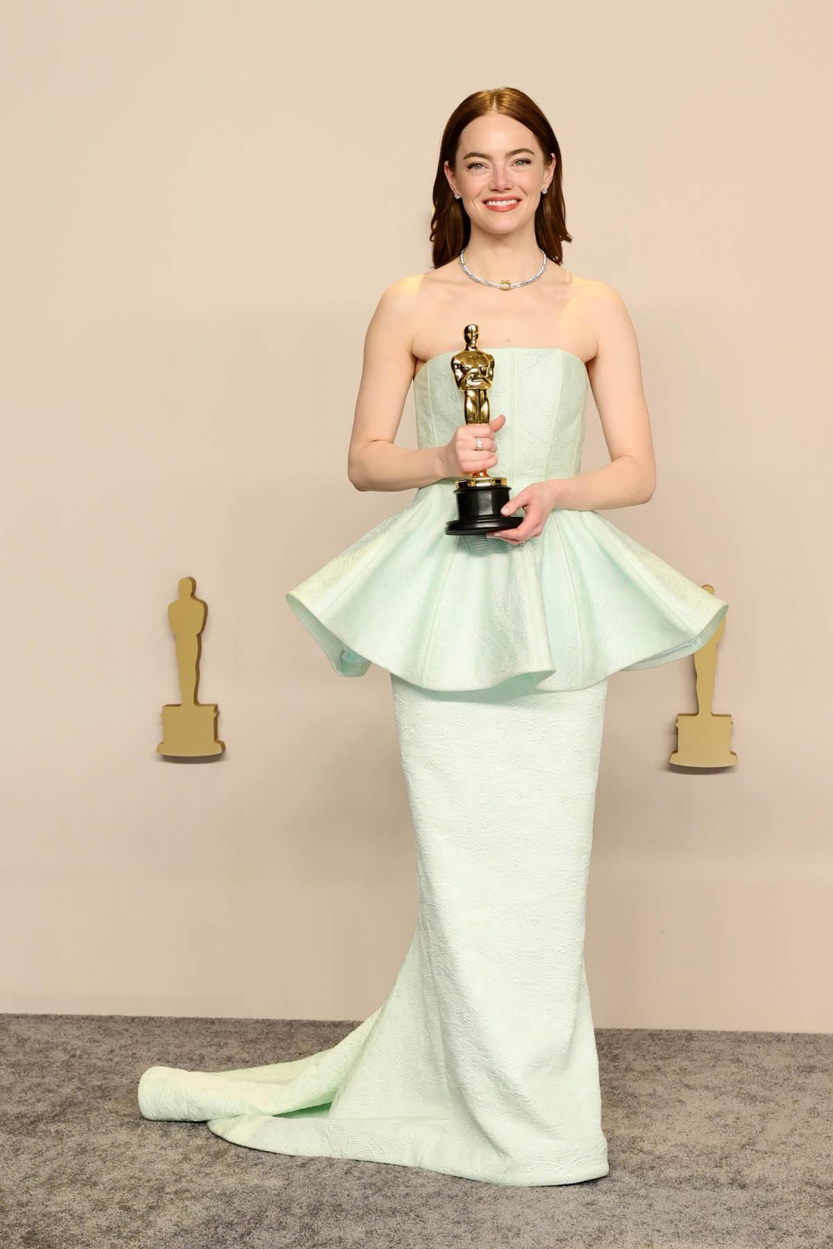 Emma Stone In Custom Louis Vuitton And High Jewelry At The 96th annual Academy Awards