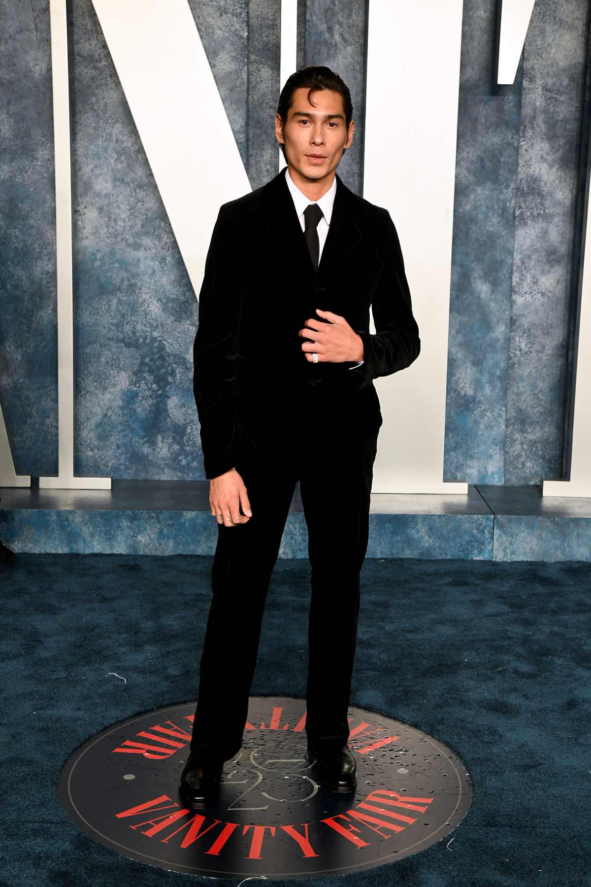 Evan Mock In Ferragamo At The Vanity Fair Oscar Party