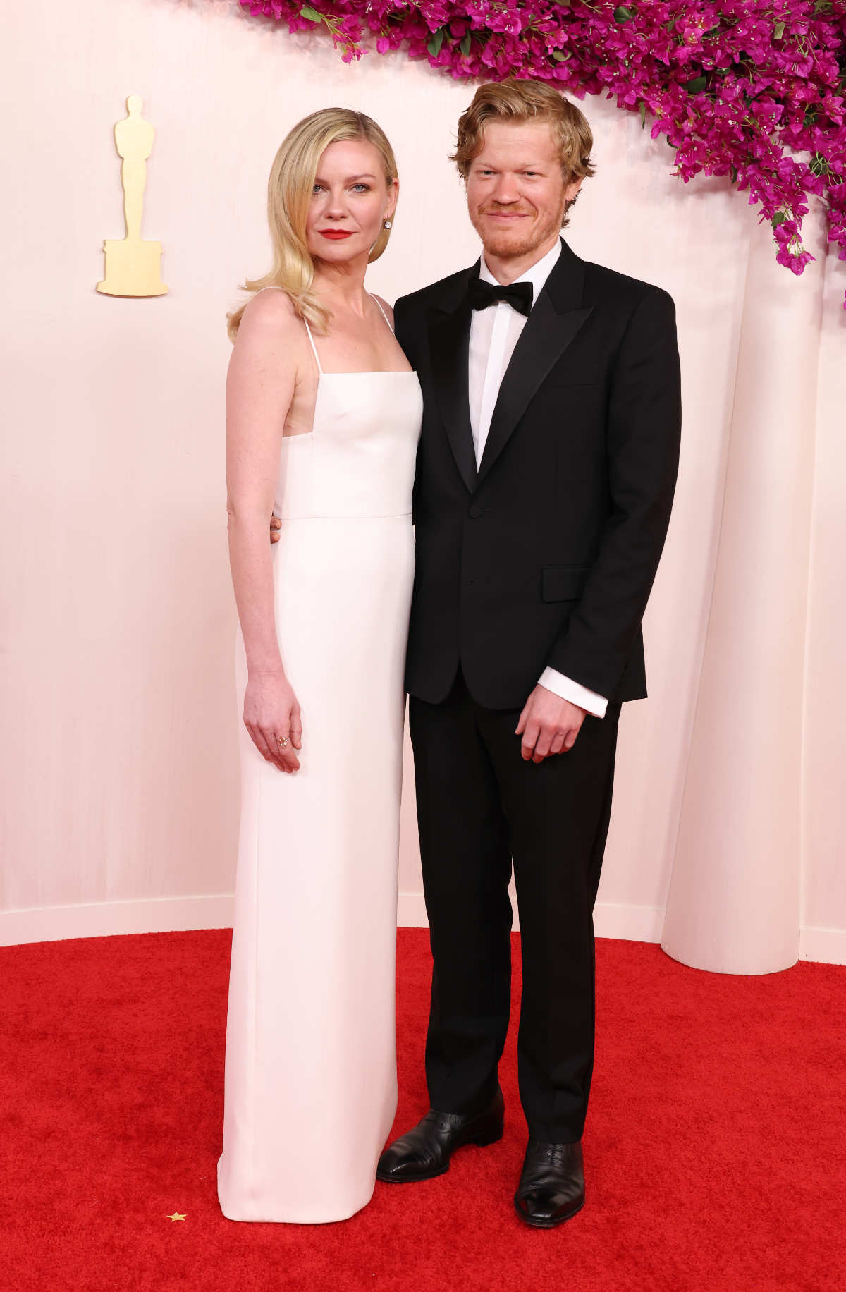 Kirsten Dunst And Jesse Plemons In Gucci At The 96th Annual Academy Awards