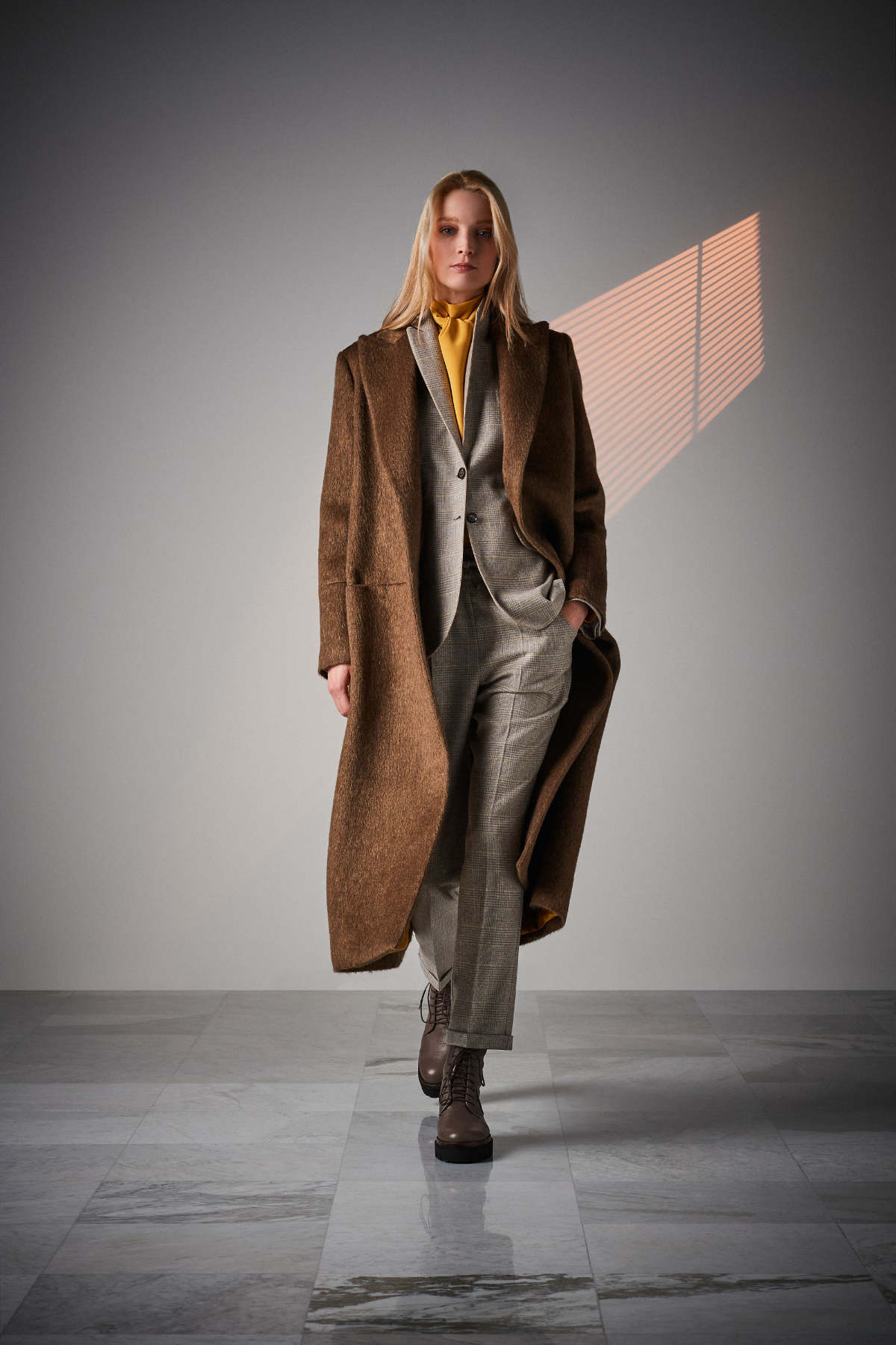 Kiton Presents Its AW 22/23 Womenswear Collection: A New York State Of Mind