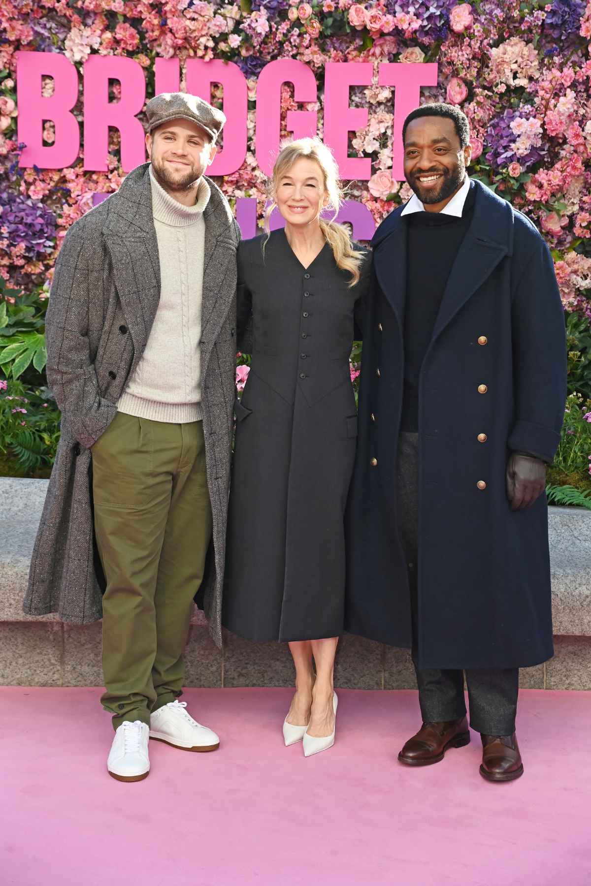 Leo Woodall & Chiwetel Ejiofor Appear In Dunhill At “Bridget Jones” Statue Unveiling