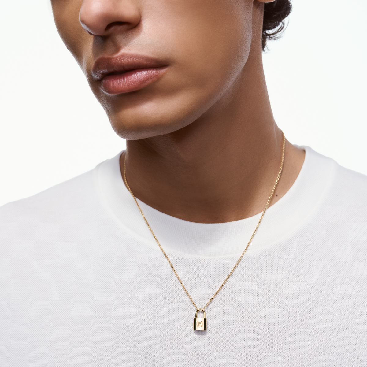 Louis Vuitton Turns Iconic Silver Lockit Gold For UNICEF