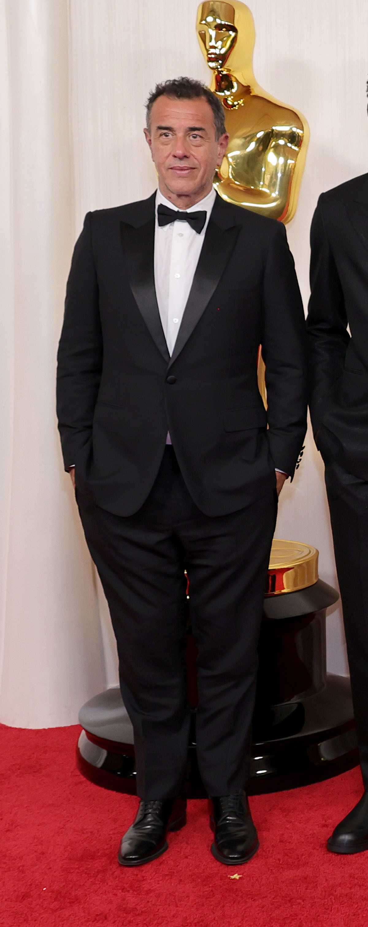 Matteo Garrone In Dior At The 96th Annual Academy Awards