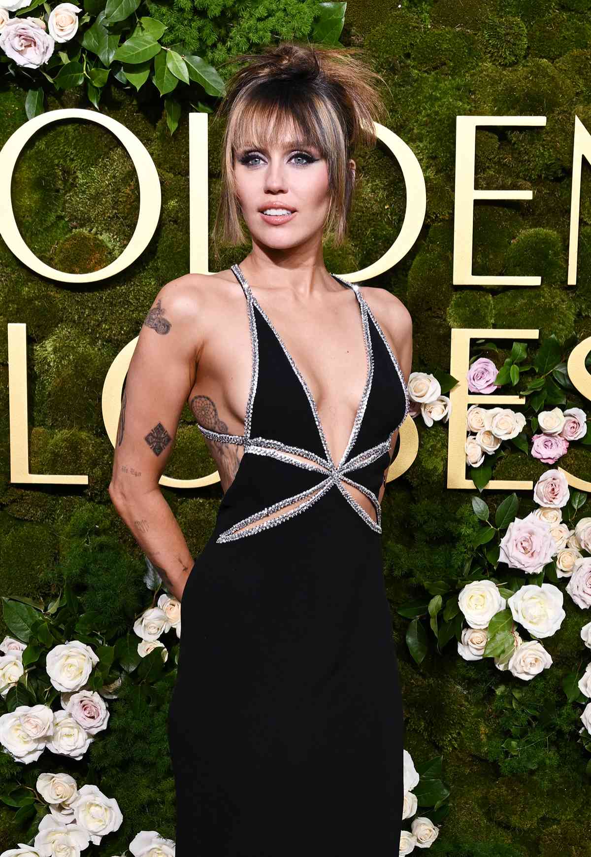 Miley Cyrus In Celine At The 82nd Golden Globes Awards