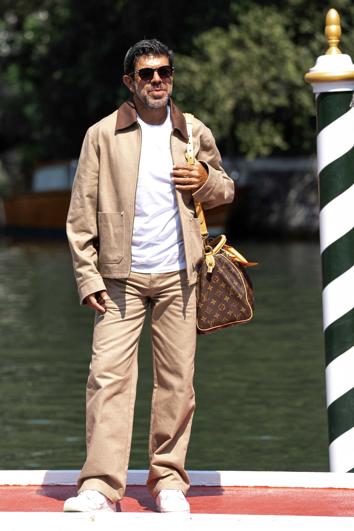 Pierfrancesco Favino In Louis Vuitton Arriving For The 81st Venice International Film Festival